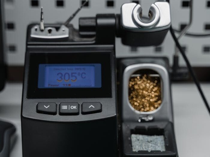 pexels-photo-6755060 A digital soldering station with temperature display ready for precision electronic repair.